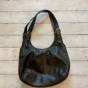 Leather coach bag.